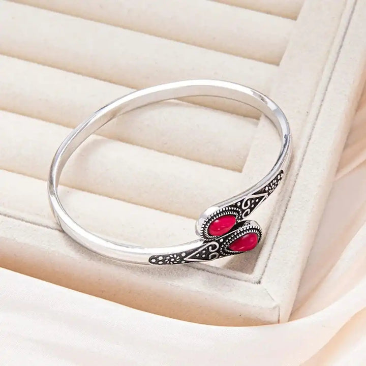 Vintage bracelet with colorful gemstones and tribal design
