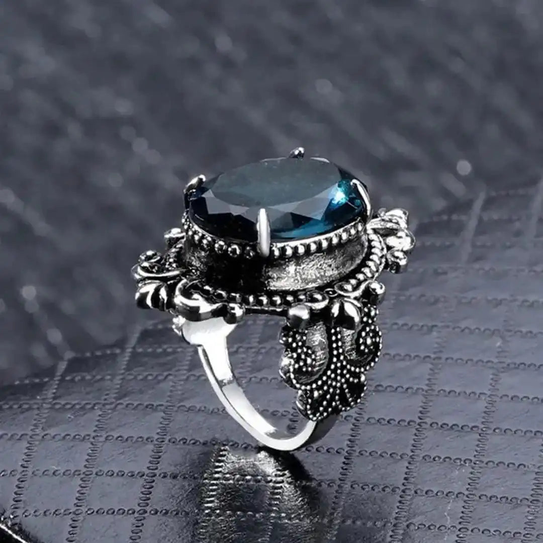 Vintage silver oval ring with blue zirconia