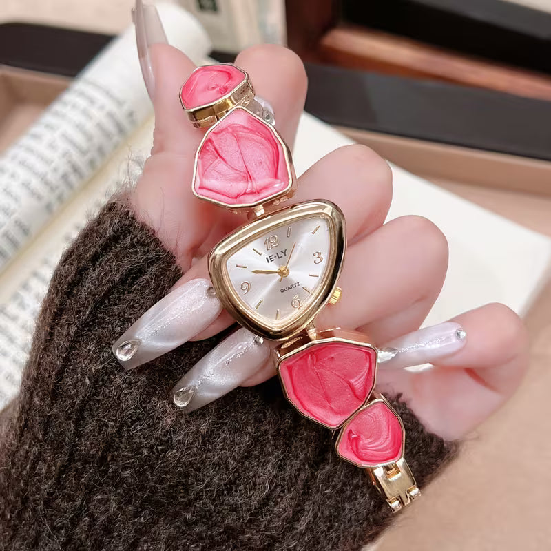 Gold watch with turquoise stone