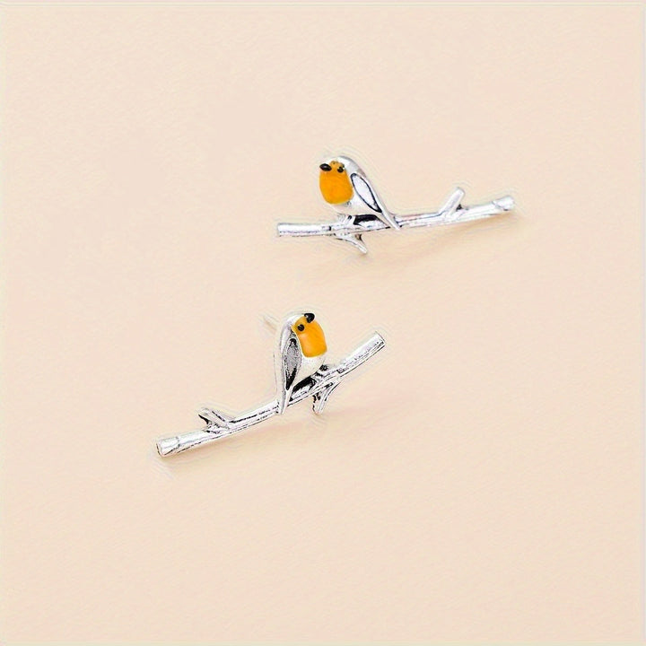 Bird motif earrings