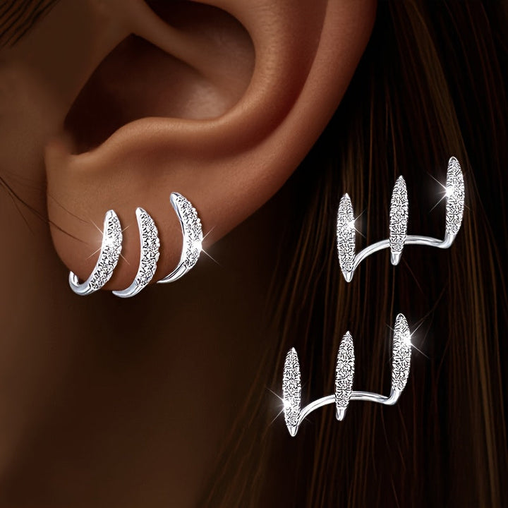 Elegant Earrings with Rhinestones and Three-Prong Setting - Haller