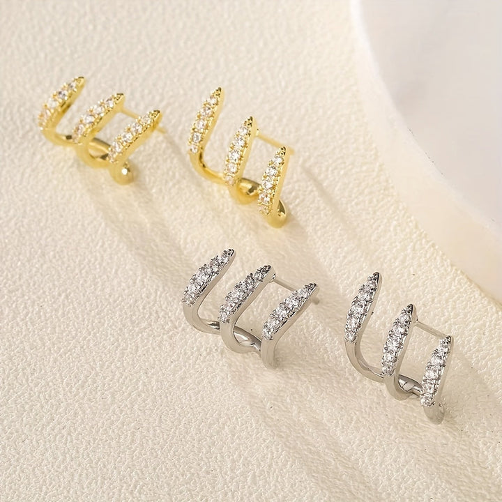 Elegant Earrings with Rhinestones and Three-Prong Setting - Haller