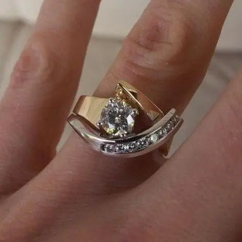 Vintage irregular ring with cubic zirconia in gold and silver