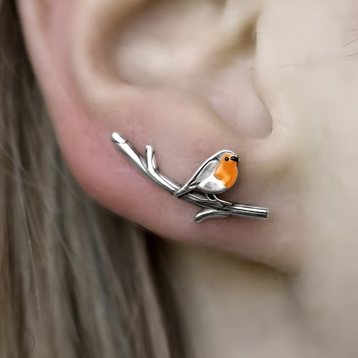 Bird motif earrings