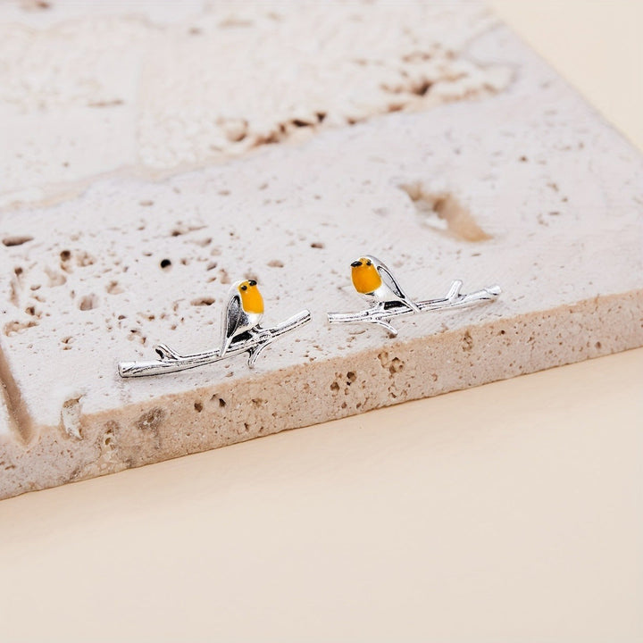 Bird motif earrings