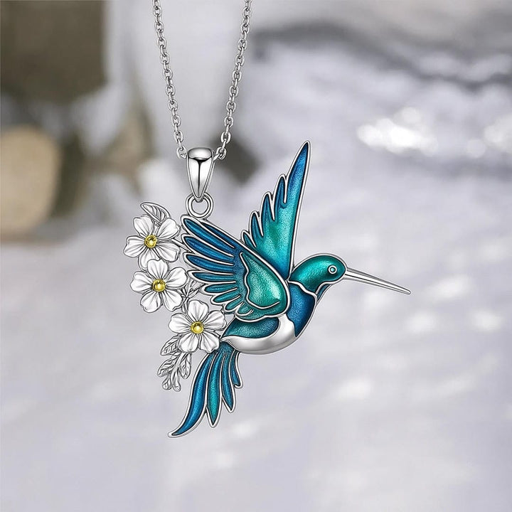 Beautiful hummingbird necklace with matching earrings