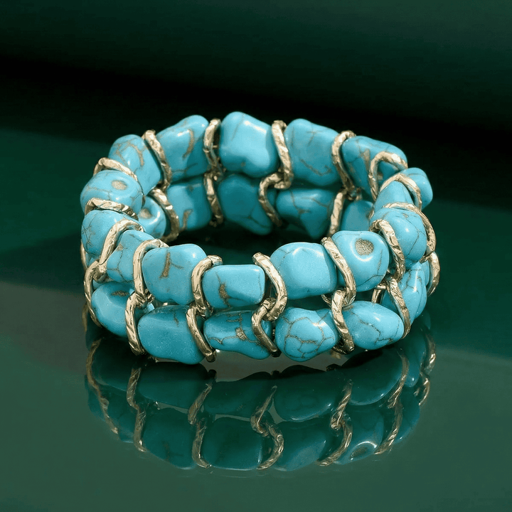 Braided gold bracelet with turquoise stone
