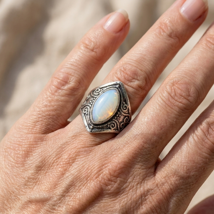 Vintage teardrop moonstone ring with embellished silver band