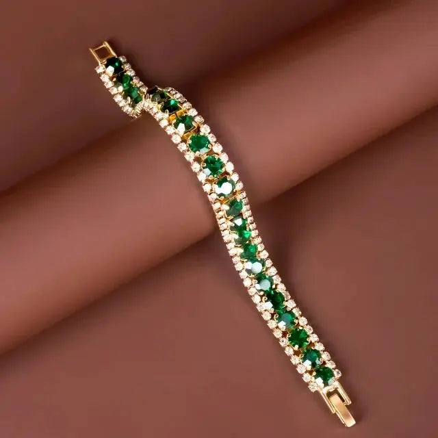 Intertwined Emerald and Gold Bracelet