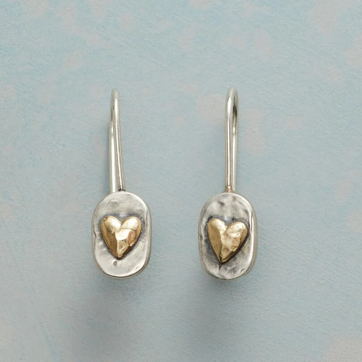 Vintage silver earrings with a gold heart