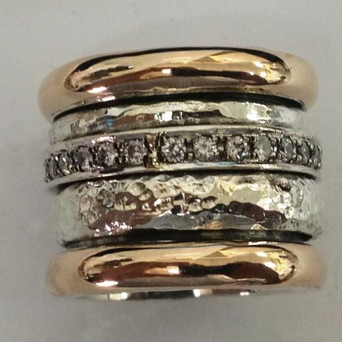 Wide vintage ring in gold and silver