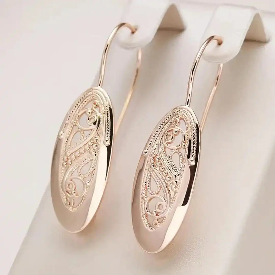 Golden radiant drop earrings