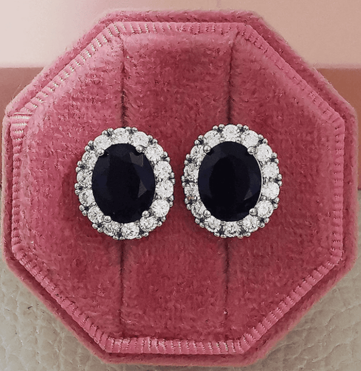 Oval white sapphire stud earrings