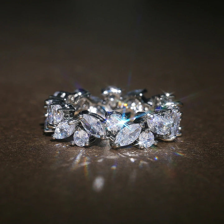 Vintage eternity ring with marquise and round diamonds
