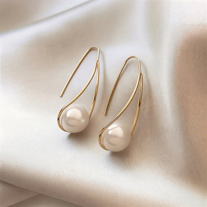 Elegant mystical pearl earrings